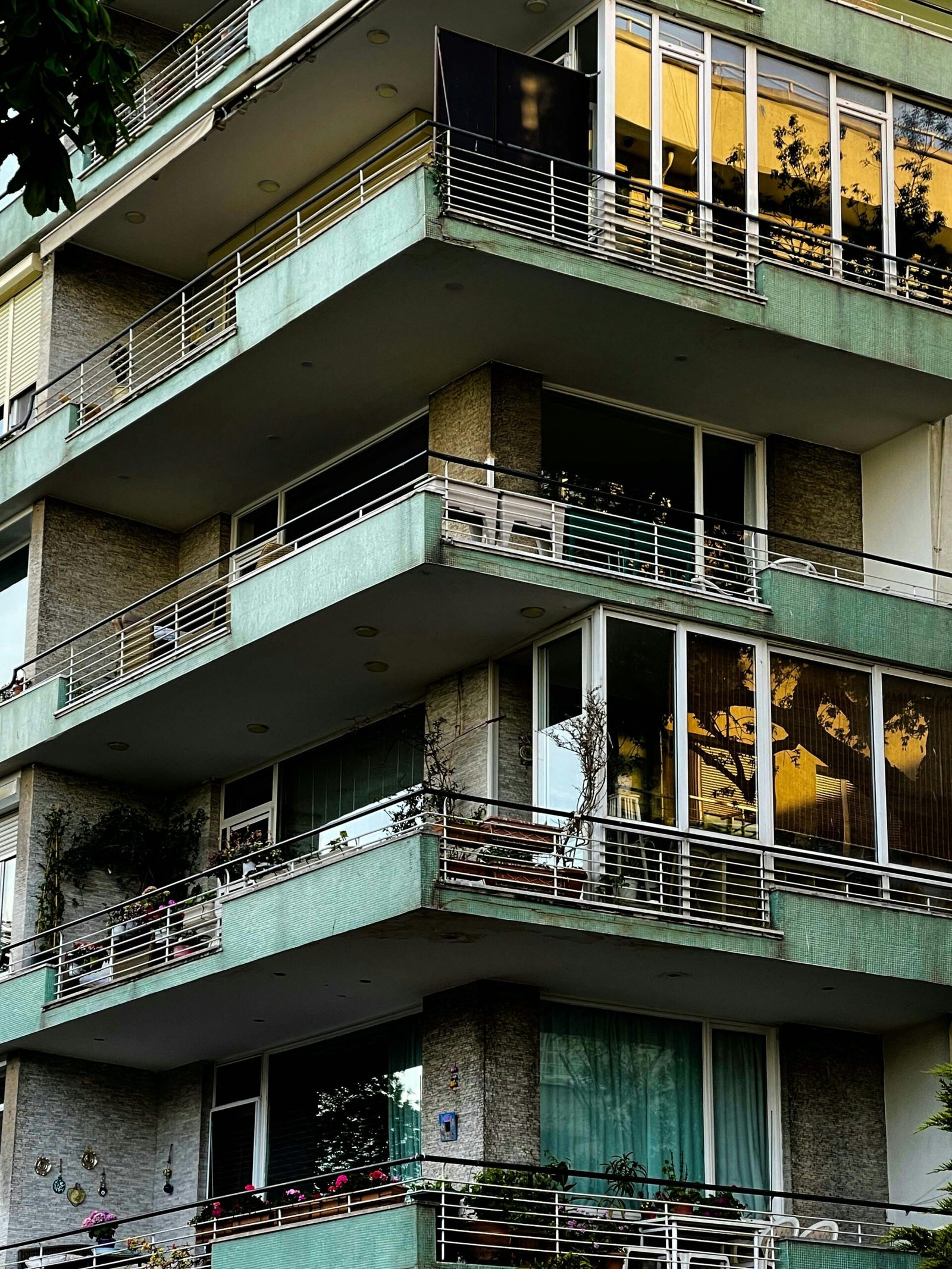 Contemporary apartment building with balconies in Kadıköy, İstanbul, showcasing urban architecture.